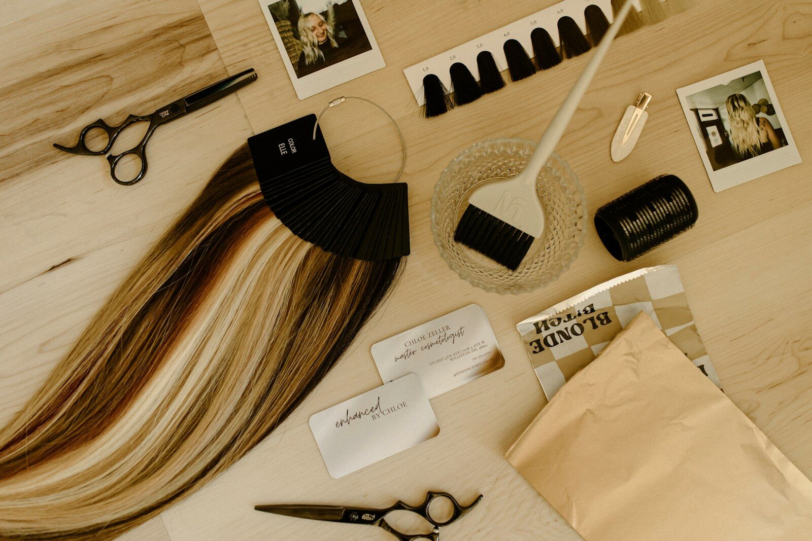 A table topped with a pair of scissors and a pair of scissors