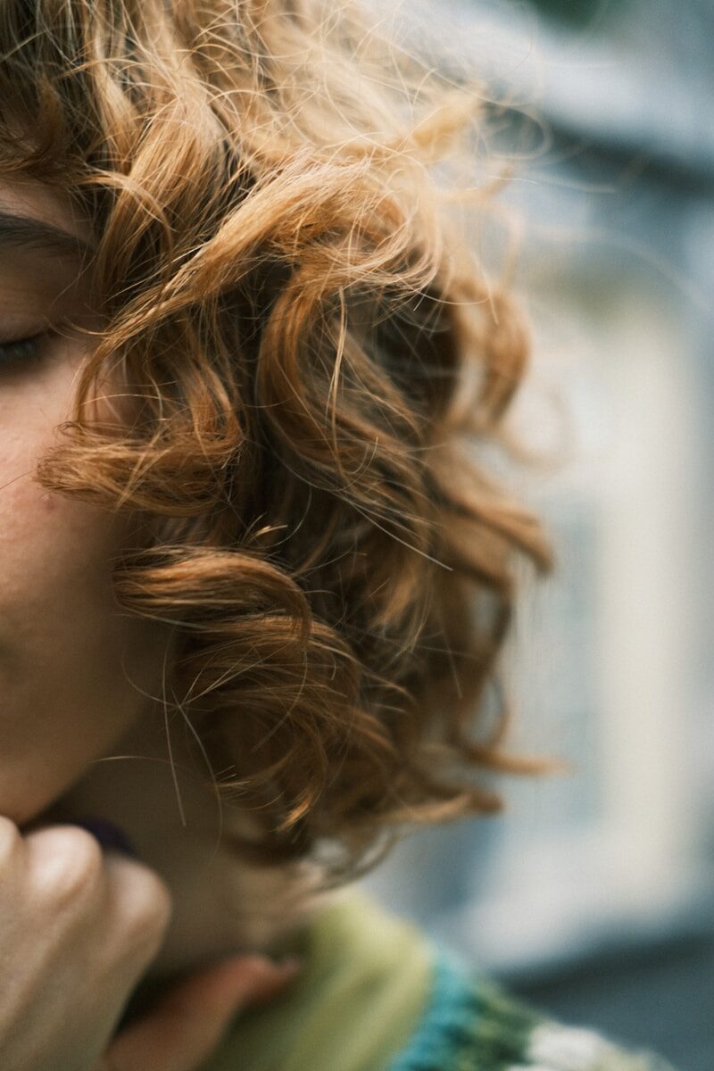 a close up of a person holding a cell phone